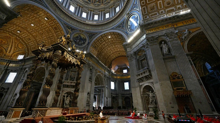 Pope Francis prays in St. Peter's Basilica before Easter Vigil