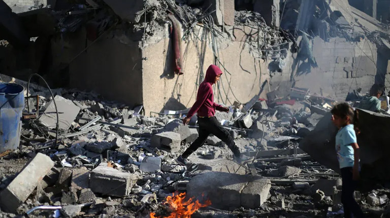 Gaza rescuers say 52 killed in Israeli strikes, including 33 in a school