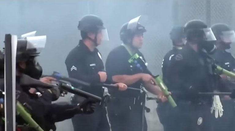 US agents, protesters clash again in Los Angeles over immigration raids